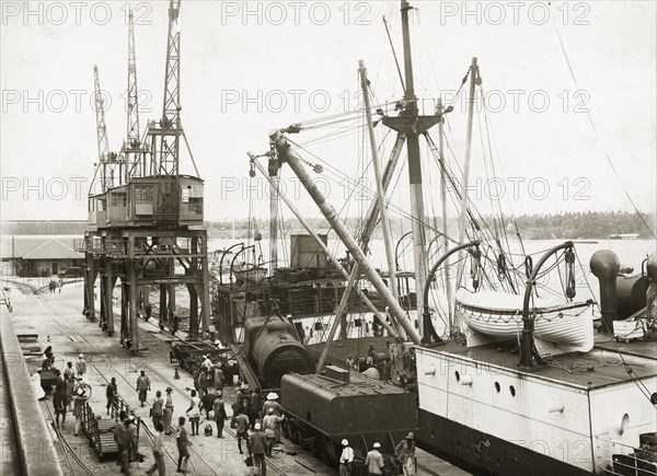 Unloading locomotive from SS Harmonides