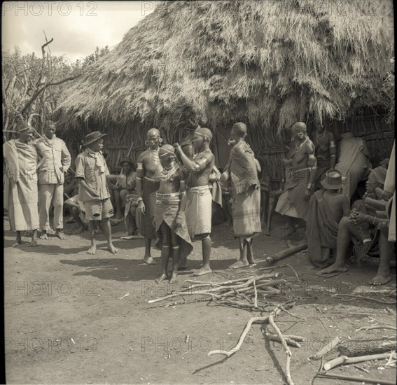 Placing the axe on the head of girl