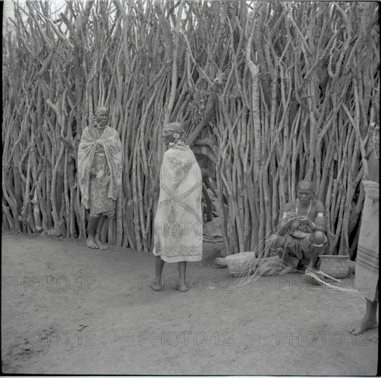 Sisters outside cattle gateway