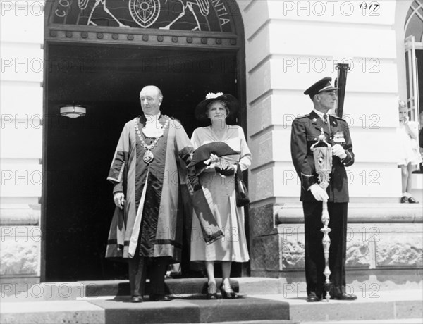 Mayor and Mayoress of Nairobi await Princess Elizabeth and the Duke of Edinburgh