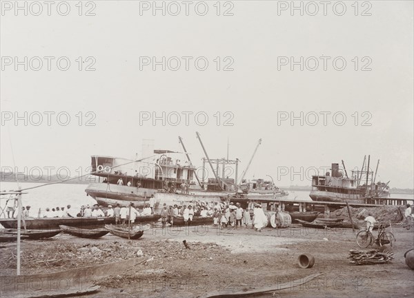 Two ships moored ready for loading at Badagry