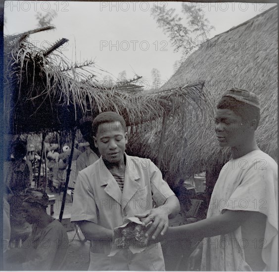 Ibadan, Market, Bernard having bought