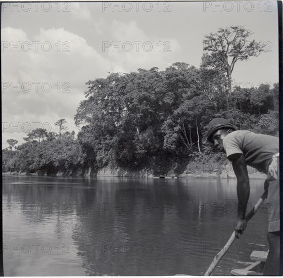 Journey from Ibadan to Cameroons, the Cross river ferry (at Mfum), crossing (poling)