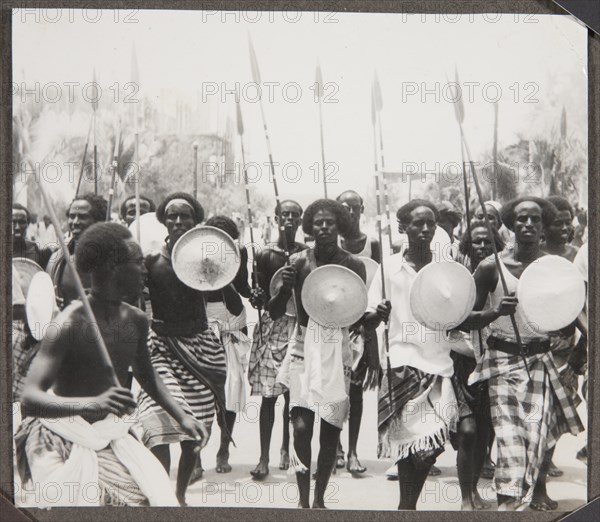 Group of Somali men with spears and shields