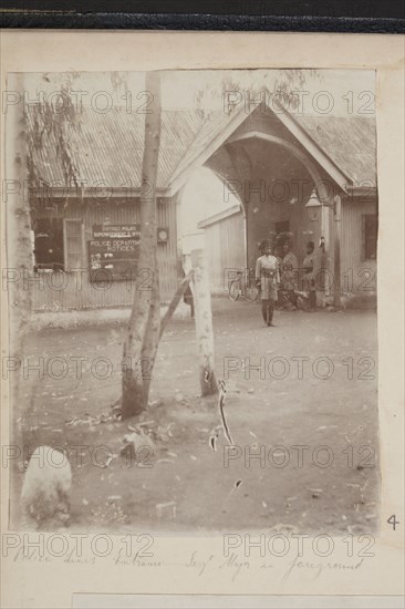 Police lines entrance with Sergt. Major in foreground