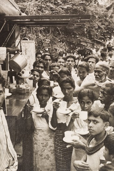 Drinking tea from a mobile kiosk