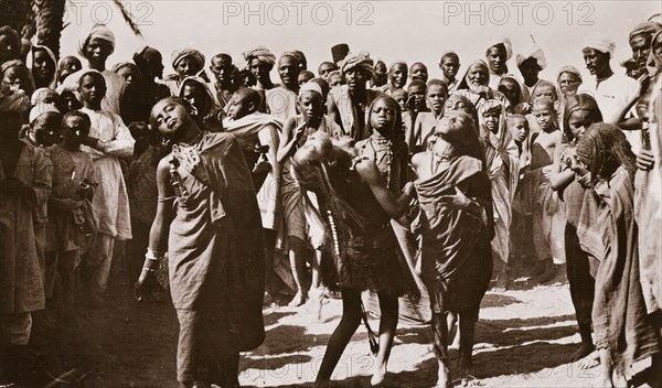 Girls and young women dancing at Dongola