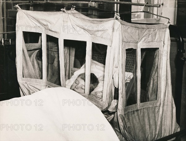 Boy In Oxygen Tent