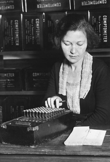 Woman Using A Comptometer