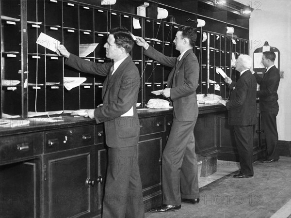 Office Men Sorting Mail