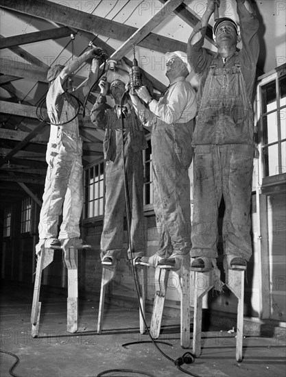 Electricians On Stilts