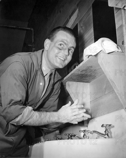 A Man Washing His Hands