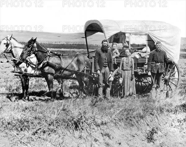 Pioneer Family And Wagon