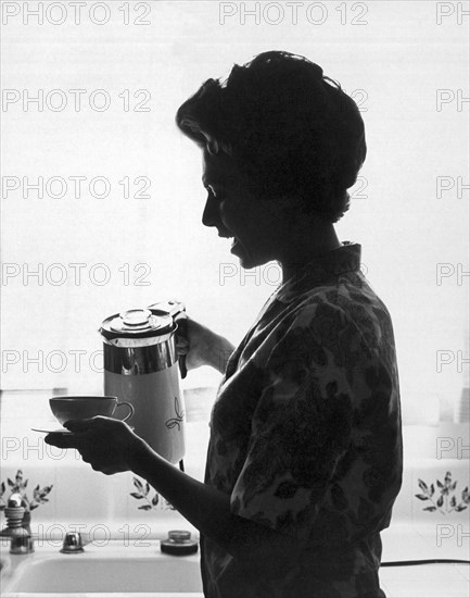 Woman Pouring Coffee