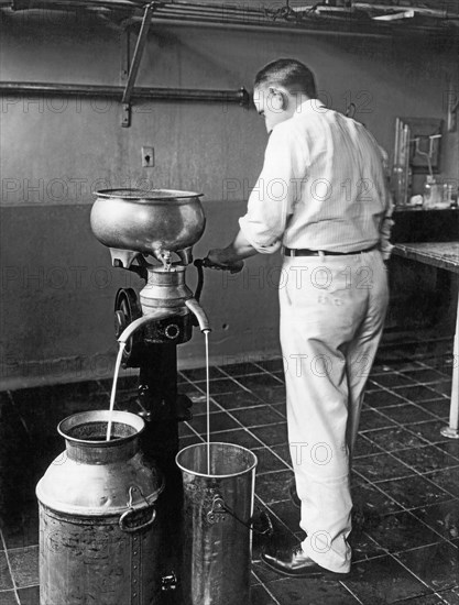 Farmer Using A Cream Separator