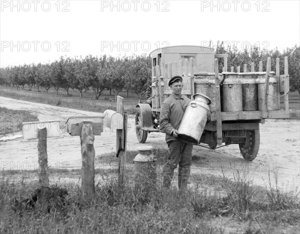 Picking Up Milk Cans