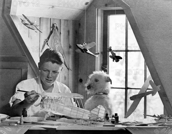 Boy Building A Model Airplane