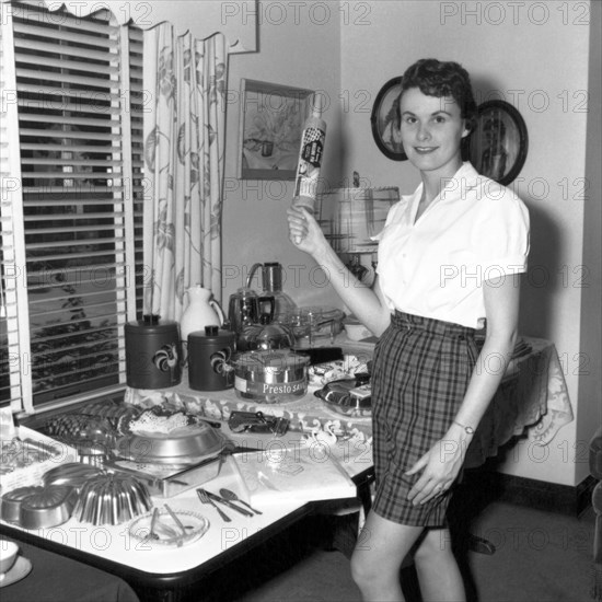 A Woman Holding A Rolling Pin