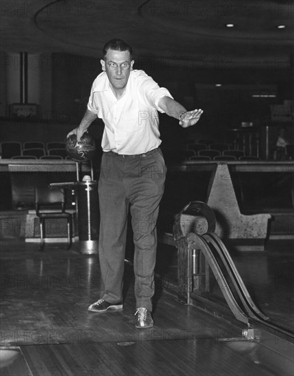 A Man Bowling