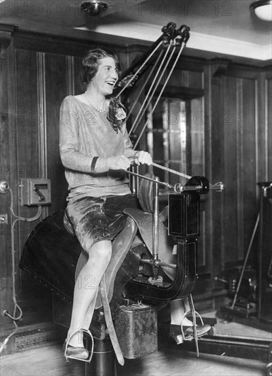 Woman Riding An Electric Horse