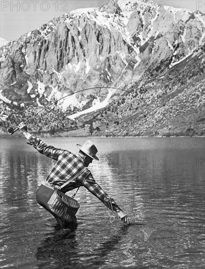 Fly Fishing In A Mountain Lake