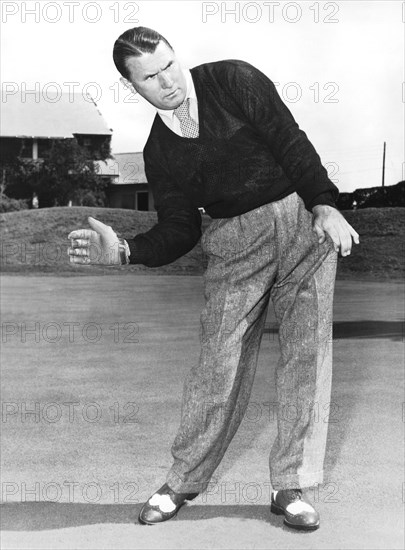 Man Posing With Sports Gear