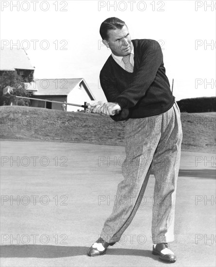 Man Posing With Sports Gear