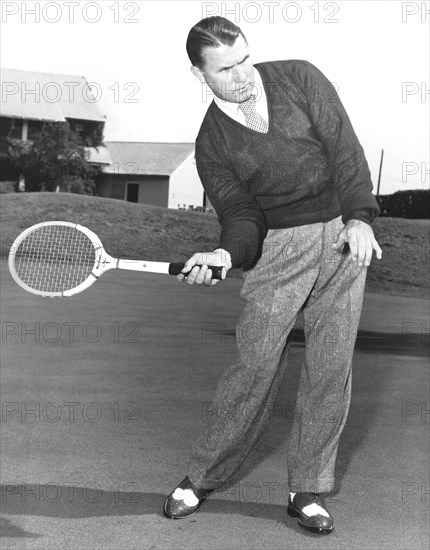 Man Posing With Sports Gear