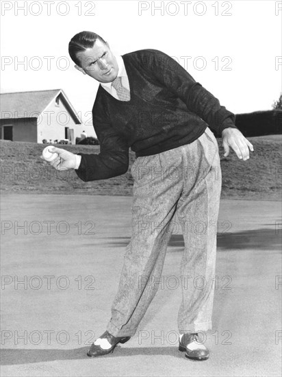 Man Posing With Sports Gear