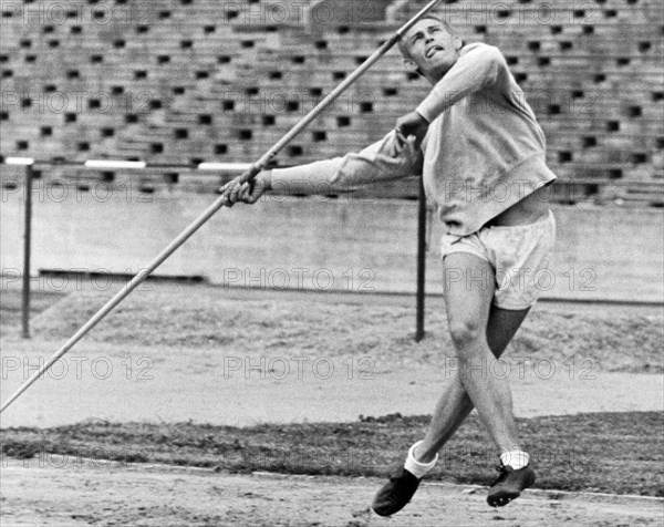 Man Throwing A Javelin