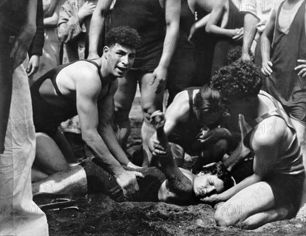 Lifeguard Resuscitating Woman