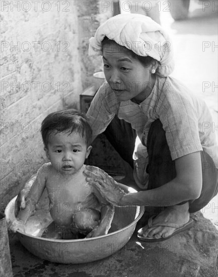 Vietnamese Orphan Bathing