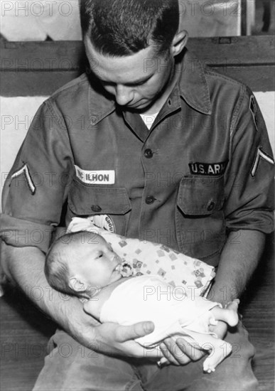 Soldier At Orphanage