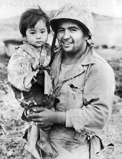 Marine Holds Injured Girl