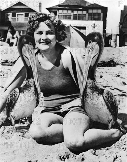 A Woman And Her Pet Pelicans