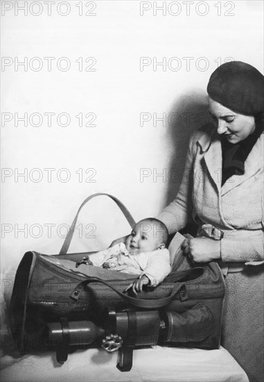 Happy Baby In Travel Bag