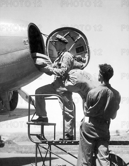 Men Loading Air Mail Bags