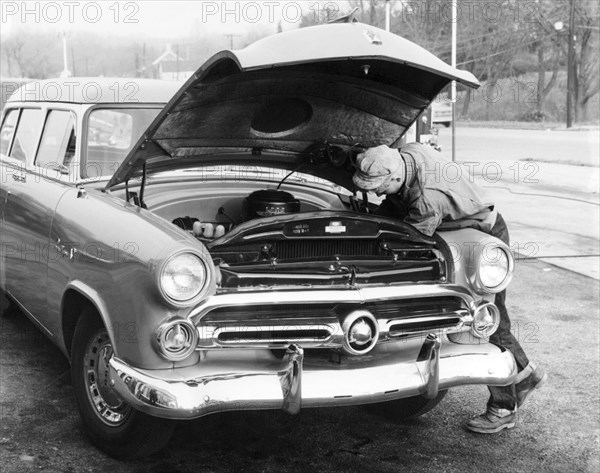 Man Working On HIs Car