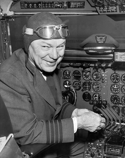 Pilot In Airplane Cockpit