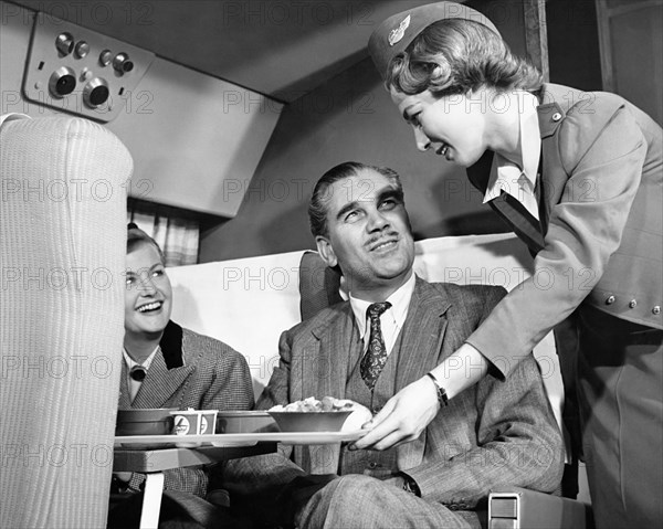 Stewardess Serving Food