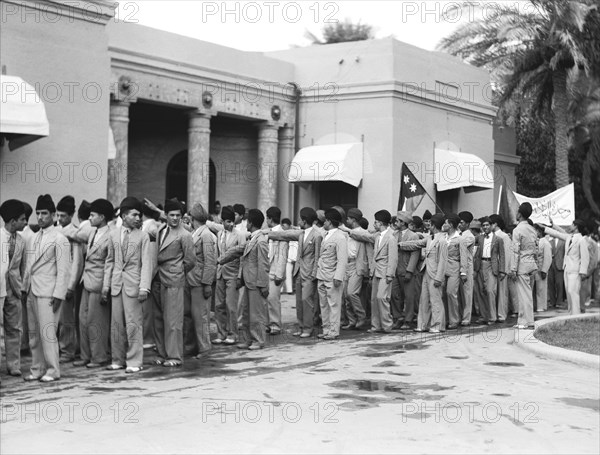 Iraqis Salute King Faisal