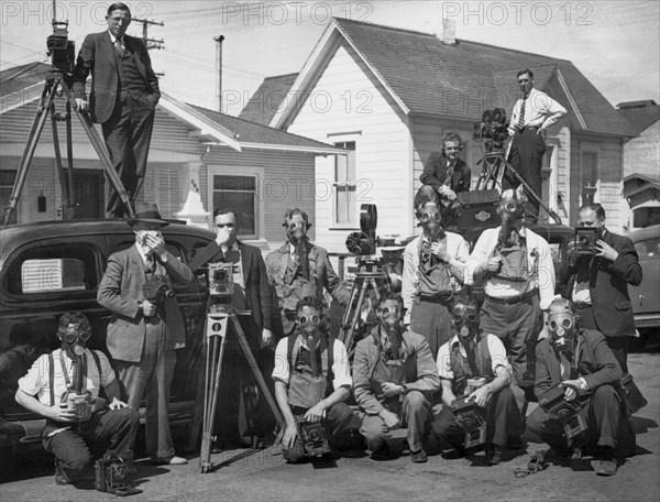 Reporters With Gas Masks