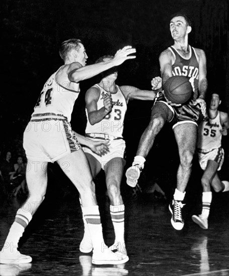 Bob Cousy Passes Basketball