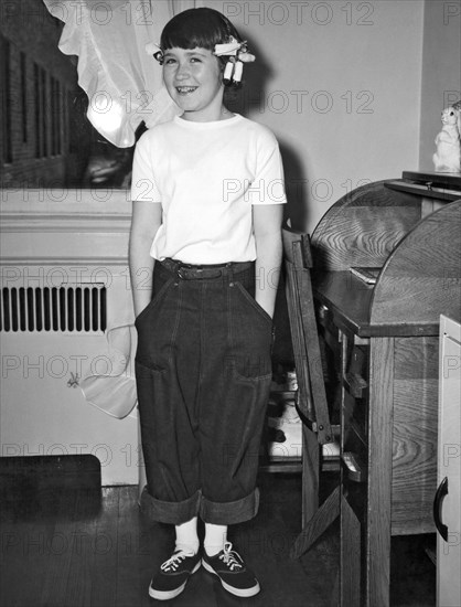 A Young Girl In Her Room