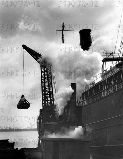 Loading Coal On To A Ship