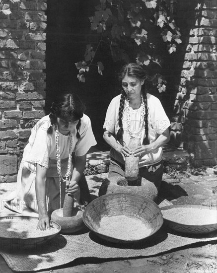 Indians Using Mortar & Pestle