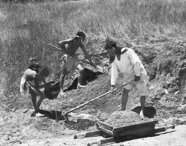 Indians Making Adobe Bricks