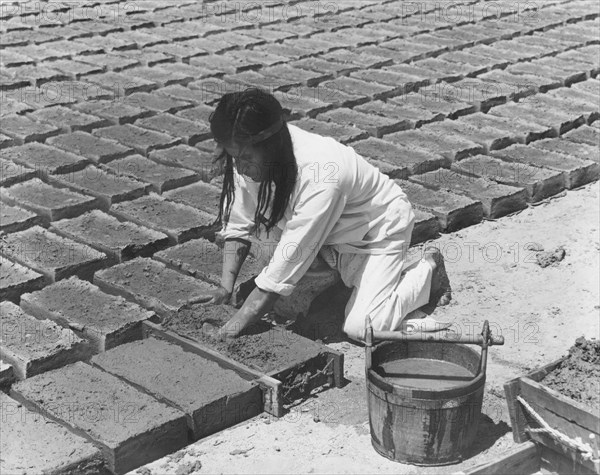 Indians Making Adobe Bricks