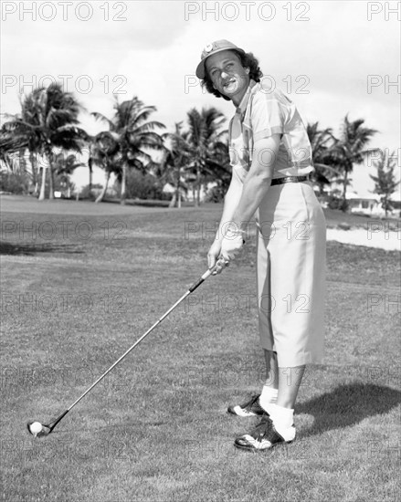 Babe Didrikson Golfing