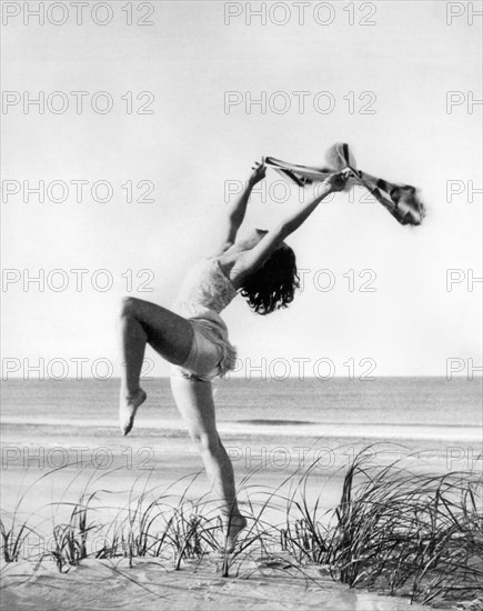 A Woman Dancing On The Shore